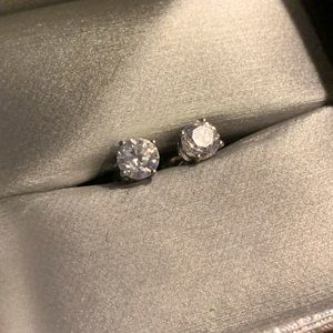 14 karat white gold 4 prong solitaire earrings